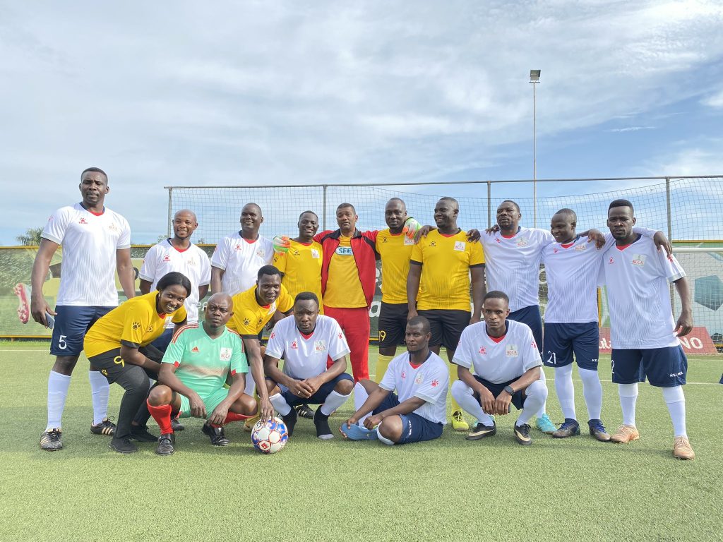 KCCA's political wing football side pose for a photo moment before kickoff.