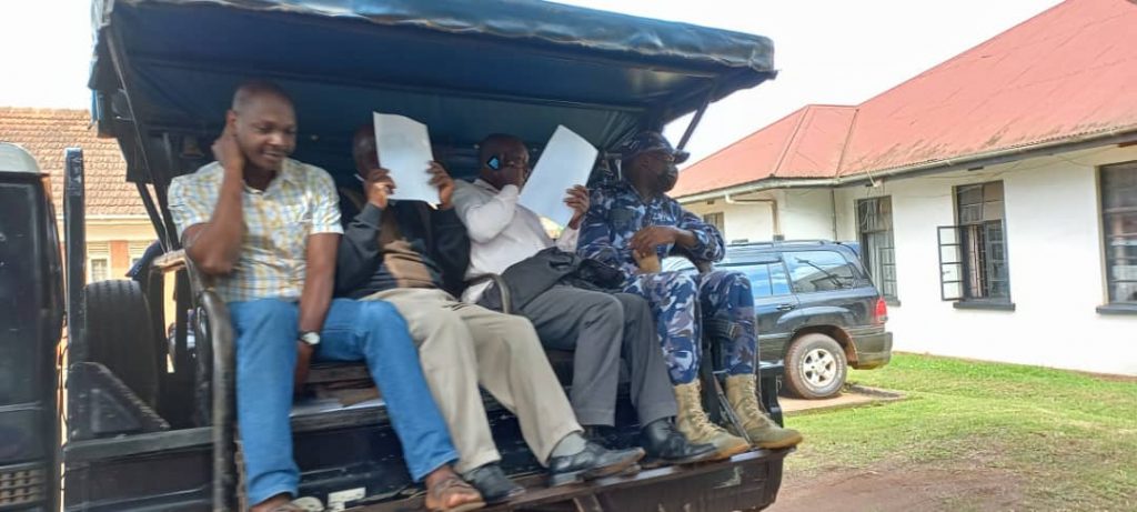 1668360517389_the two Rubaya sub county officials (centre ) after there arrest