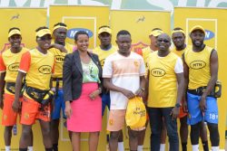 KCCA FC's Muhoozi (Front row Left) and the KCCA team received the MTN Kampala Marathon kit from MTN's Okwi (Front row Right)