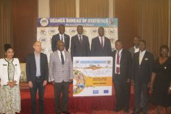 Minister Gidudu Mafabi in a group photo with officials from UBOS, ILO and EU after launching the report on Wednesday(1)