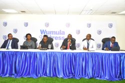 Stanbic Bank Uganda executives speaking to journalists in Kampala on thursday
