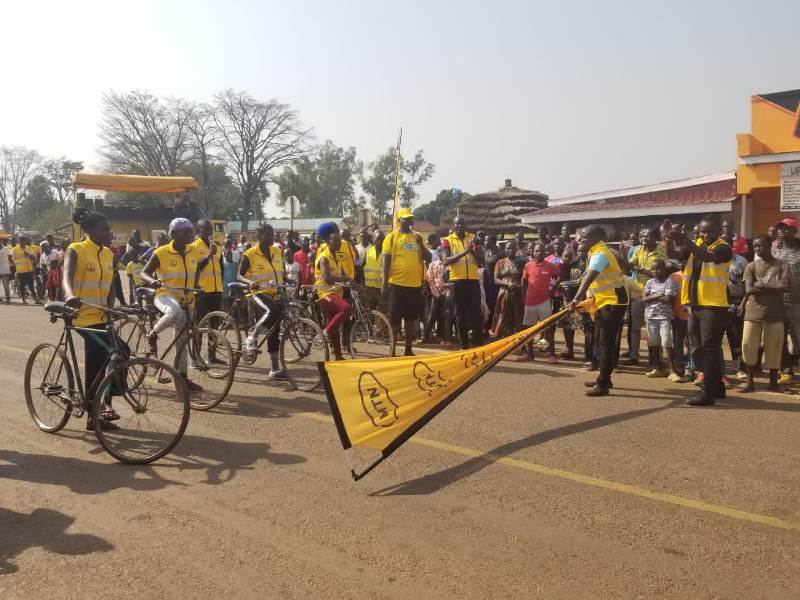 Flagging off cyclists at Anaka Town Council in Nwoya District on Sunday