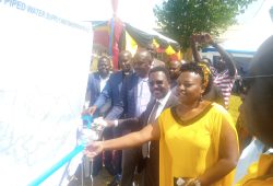 Commissioner Eng. Twinomujuni (in glasses), wife Loyda (in yellow)during the mega water project launch