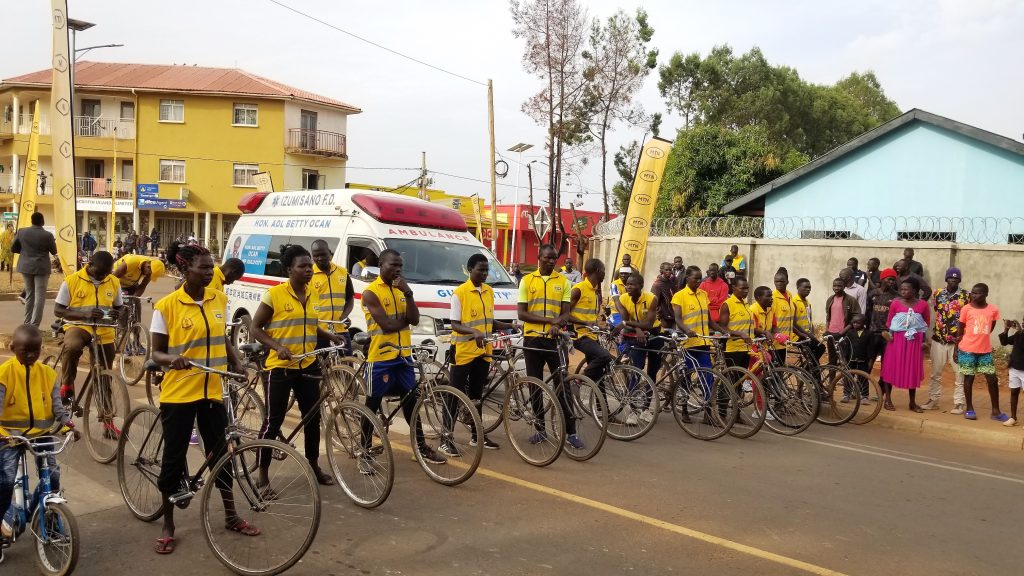 Cyclists pose for a photo before the final bicycle race (Photo by Michael Ojok)
