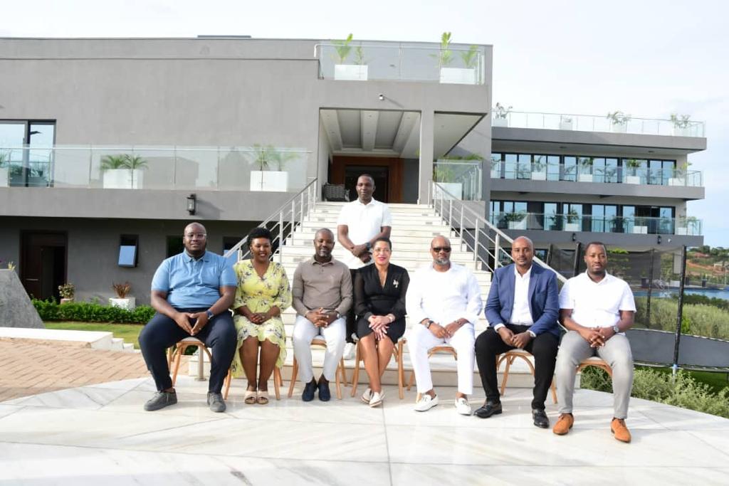 Emma (second right) with Toyota, Parliament bosses and other MK strategists