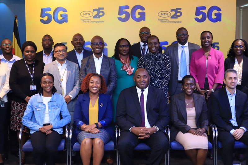 Picture Moment with the Minister of ICT and National Guidance, Members of MTN Uganda's Executive Committee and top members