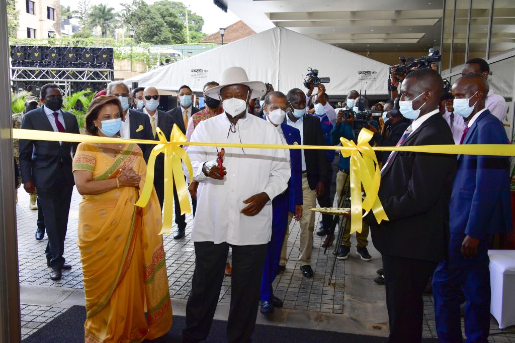 President Museveni cuts the tape as he commissions Four Points by Sheraton Hotel at Kololo on Tuesday. PPU Photo