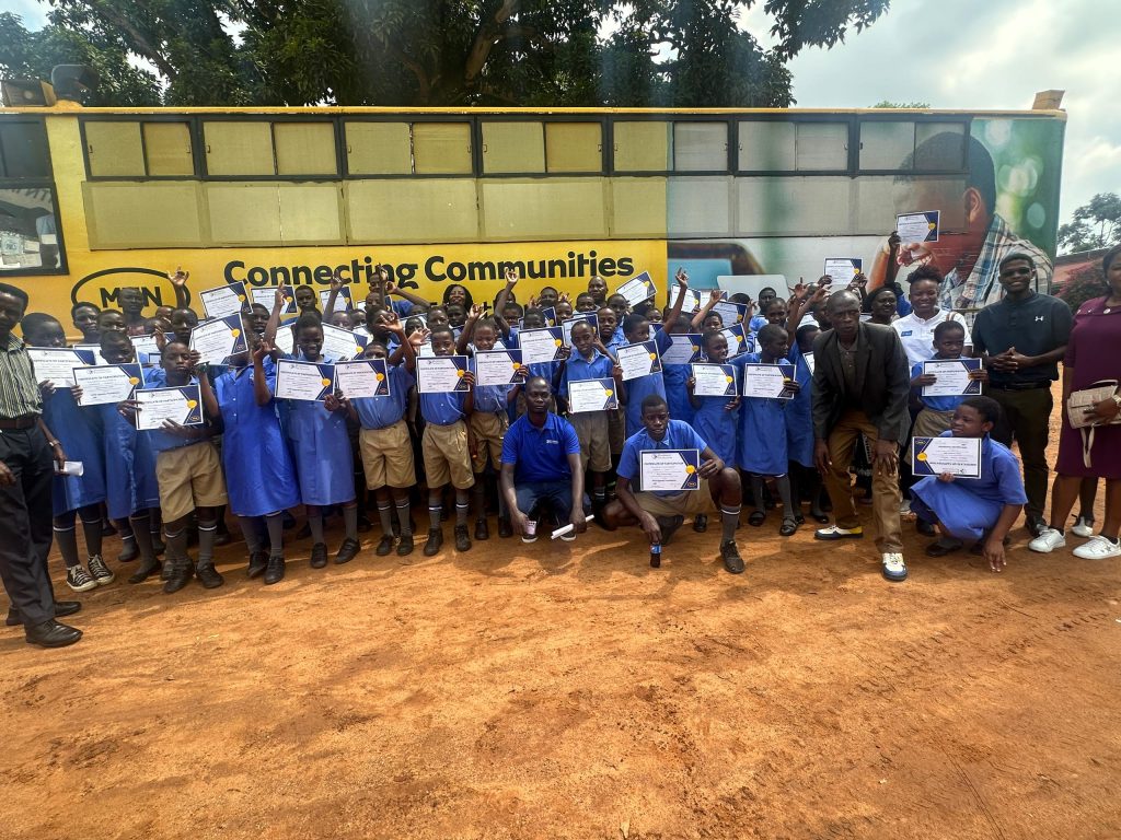 Learners of Uganda School for the Deaf showcase their ICT certificates courtesy of MTN Foundation