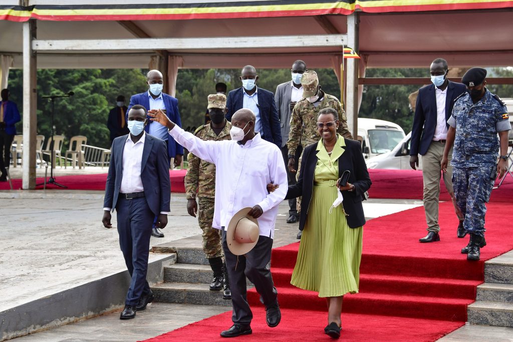 President Museveni and First Lady Janet wave to students during the pass out patriotism students from secondary schools around Kampala at Kololo on Thursday. PPU Photo (2)