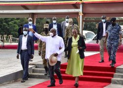 President Museveni and First Lady Janet wave to students during the pass out patriotism students from secondary schools around Kampala at Kololo on Thursday. PPU Photo (2)