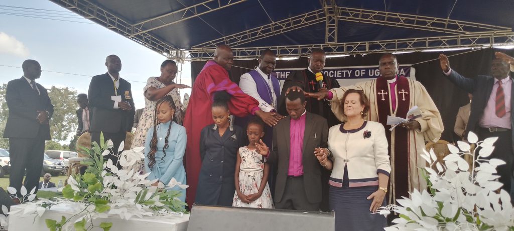 Bishop Dr. Silas, wife, Children and the a group of Clergy during consecration at Kamukuzi hill