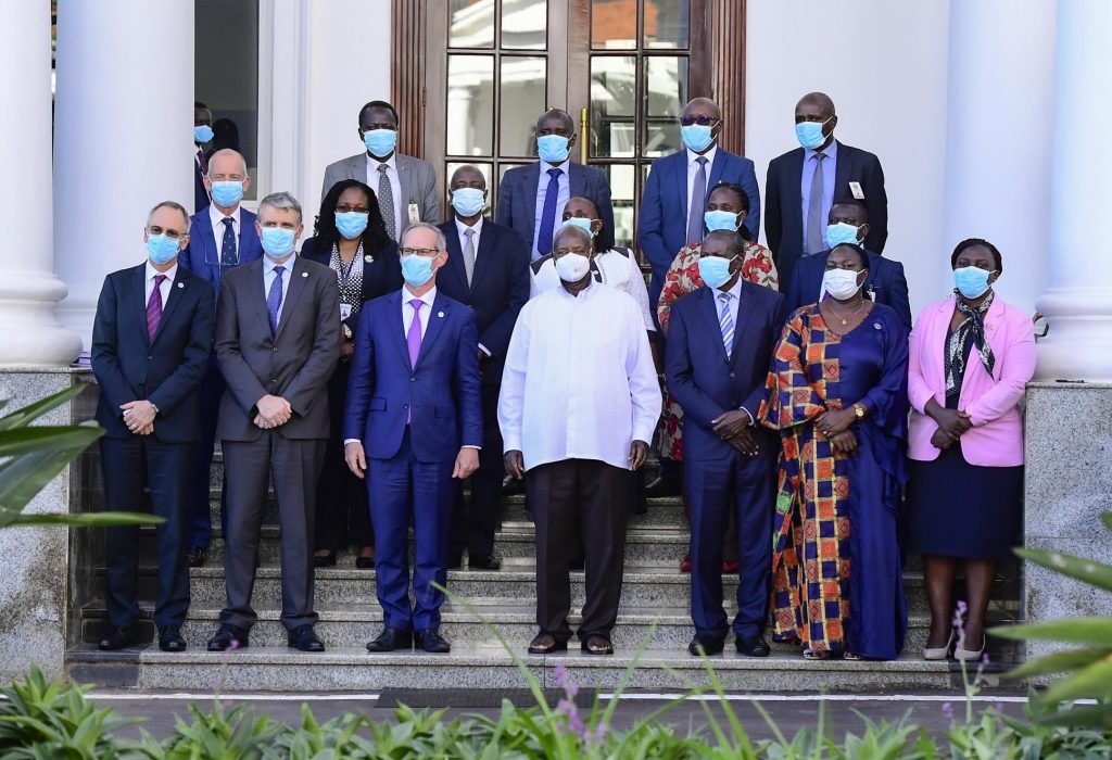 President Museveni in a group photo with the President of Total Energies and his delegation at SHE - 01
