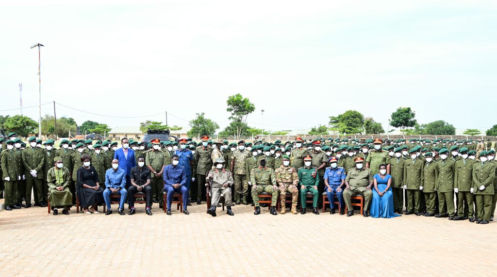President Museveni (C) together with CDF Muhoozi, Gen katumba and Hon Mateke with Tanzania and Mali officials (all seated) pose for a photo with officer cardets during their commissioning at Kaweweta on (1)