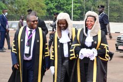 speaker of Parliament Anita Among and her deputy Thomas Tayebwa (C) and the clerk of Parliament Adolf Mwesigye (L) share a light moment at Kololo on Thursday. PPU Photo (1)
