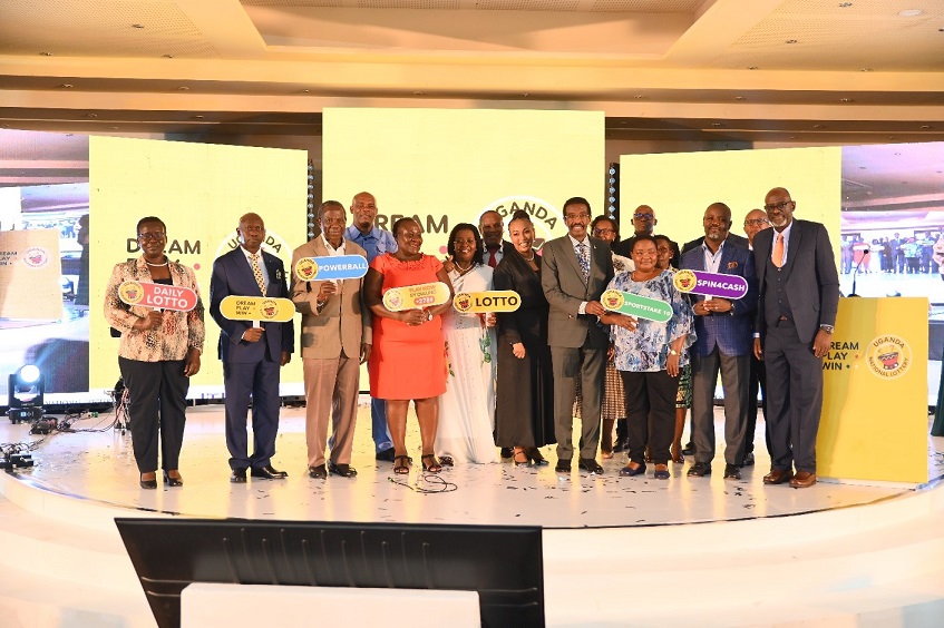 Key government officials, ITHUBA Uganda directors and the Board of Directors of the National Lotteries and Gaming Regulatory Board take a group picture to celebrate the official launch of