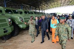 Gabon's Prsident Brice Oligui Nguema and delegation inspecting some of the military armoured vehicles being assemblled at Nakasongola during his tour of the facilities on Friday. PPU Photo.nak15