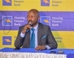 John-Baptist-Kaweesi-the-Head-of-Mortgage-and-Consumer-Banking-addresses-guests-during-the-launch-of-the-Double-Double-Unsecured-Salary-Loan-Campaign