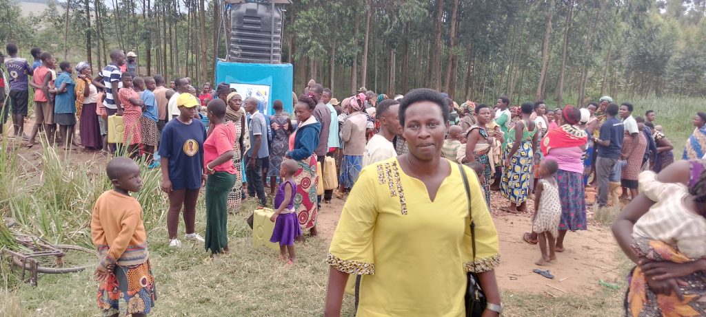 Josyline Bata Kamateneti after the commissioning of water in Nyarwanya