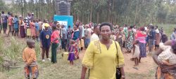 Josyline Bata Kamateneti after the commissioning of water in Nyarwanya