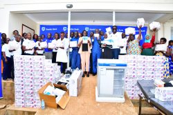 Stanbic Bank Representatives,Hospital Officers and other Officials pose for a photo during the handover of maternal health materials.