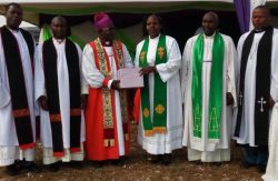 The West Buganda Anglican diocese Bishop Henry Katumba Tamale in (Red Cassock) alongside other priests