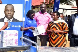 Diana Ondoga, the Stanbic Bank head of Corporate Social Investment handing over a Mama kit to the Vice president Jessica Alupo during the event at Katakwi general hospital hospital in Teso Subregion.