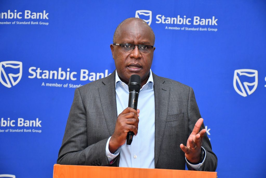 Francis Karuhanga, the Stanbic Uganda Holdings Limited making remarks during the Forum (1)