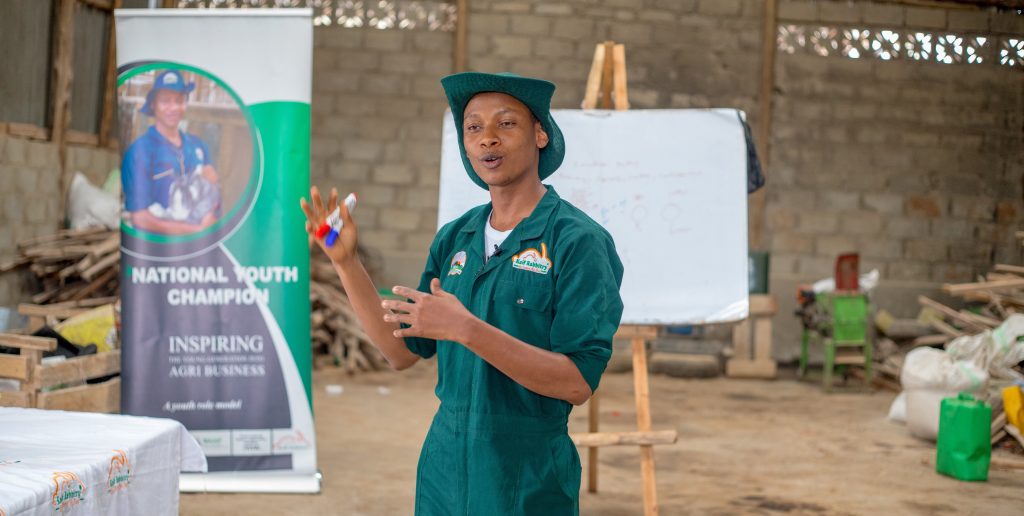 Muhawiyah Mukasa while sharing knowledge with other farmers (1)