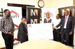 Equity Bank Uganda Officials Handing Over a Donation of Shs 30 million towards the 2025 Martyrs Choral Festival