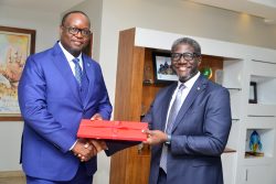 Stanbic's Chief Execuitive Mumba Kenneth Kalifungwa (L) and Sam Mwogeza, the bank's Executive Director (1)