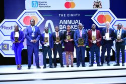 A photo moment of Stanbic's Mumba after awarding sponsors for the Annual Banker's Conference