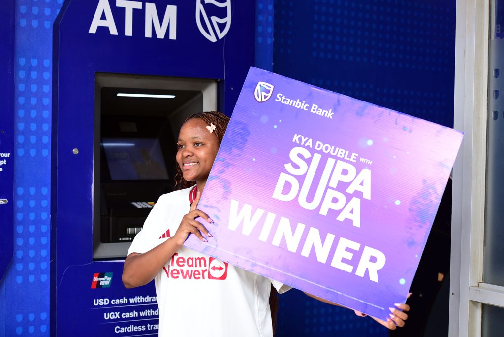 Daniella Muwanga Nantege, received a UGX 1.5 million cheque during a Wednesday morning ceremony at the Stanbic Mbarara branch.