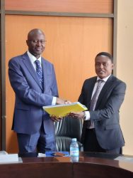 Kasiribayo handing over to the new Administrator General Manzi