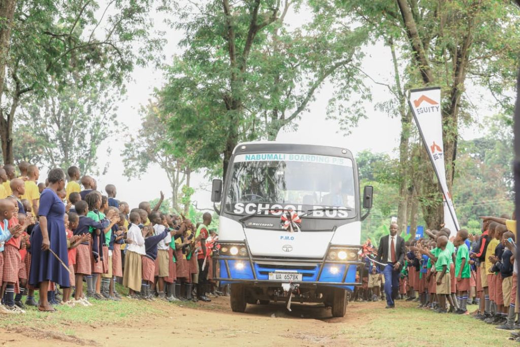 The Brand New Bus arriving through the gates of Nabumali Boarding Primary School