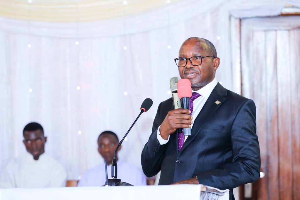 Centenary Bank Managing Director, Fabian Kasi addressing the congregation during Nankulabye Parish Youth Conference