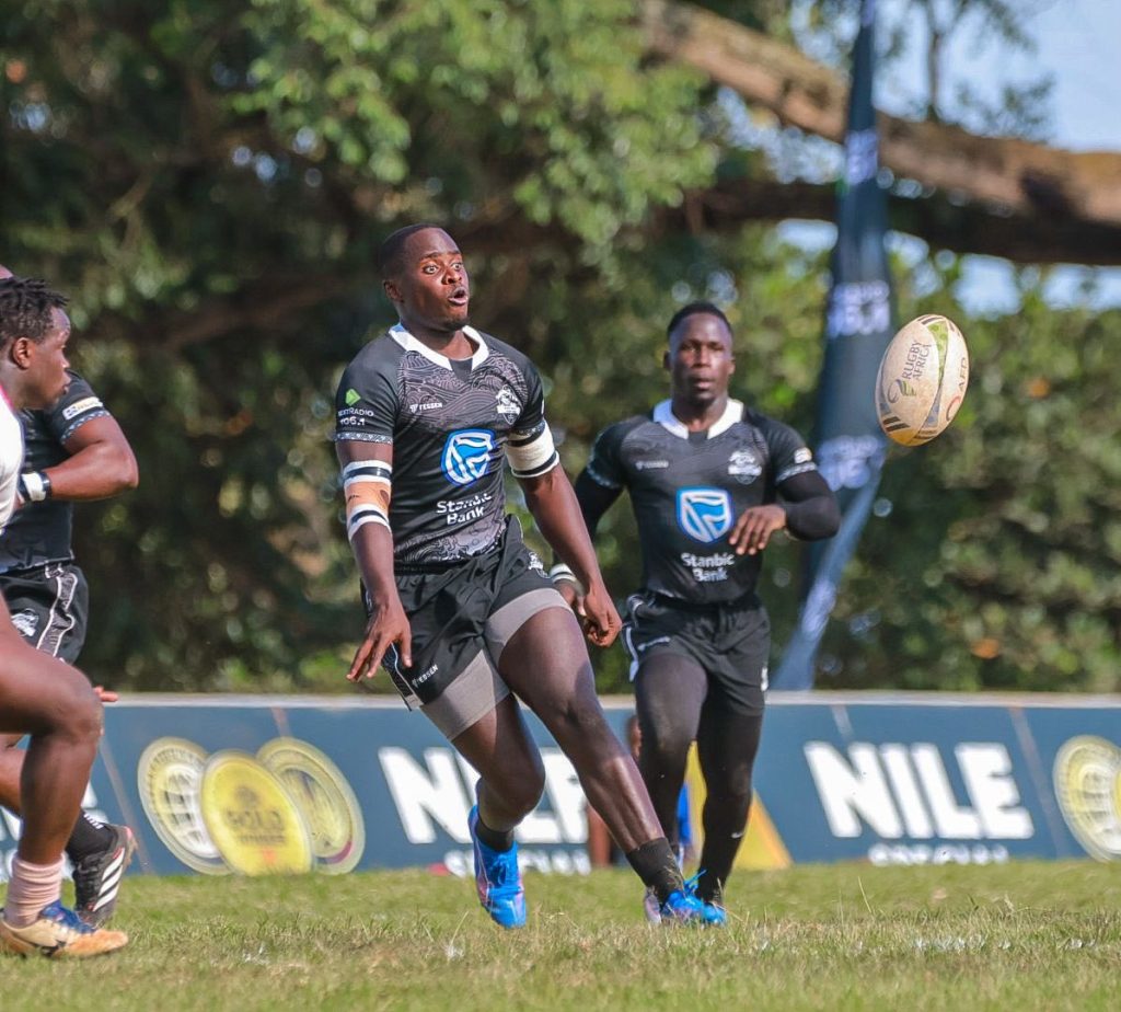 William Nkore (C), the King of Coversations in action