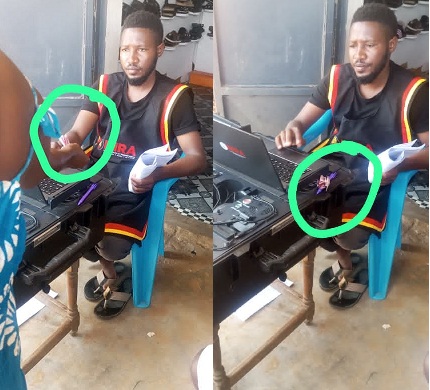 A NIRA contractor appear to receive money from one of Bundibugyo residents seeking services