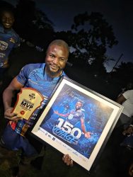 Conrad Wanyama displays some of the gifts