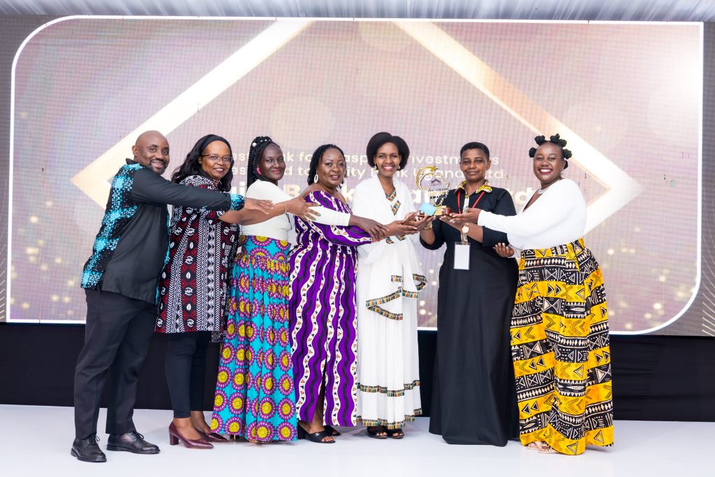 Equity Bank top officials join in celebrating the milestone