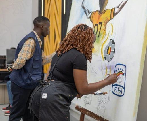 An artist gives an impression of the Uganda Cranes jersey theme