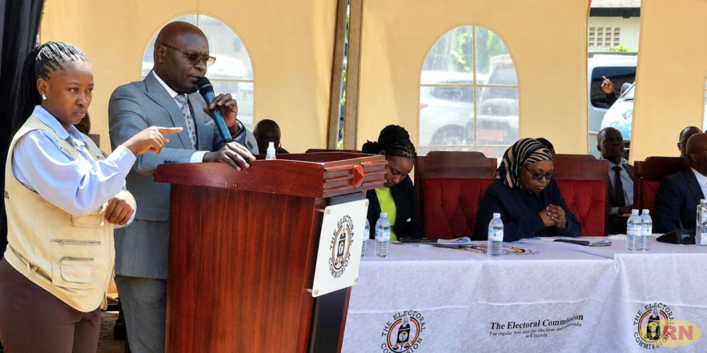 Electoral Commission Chairperson Justice Simon Byabakama Mugenyi addressing journalists on Monday.