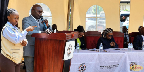 Electoral Commission Chairperson Justice Simon Byabakama Mugenyi addressing journalists on Monday.