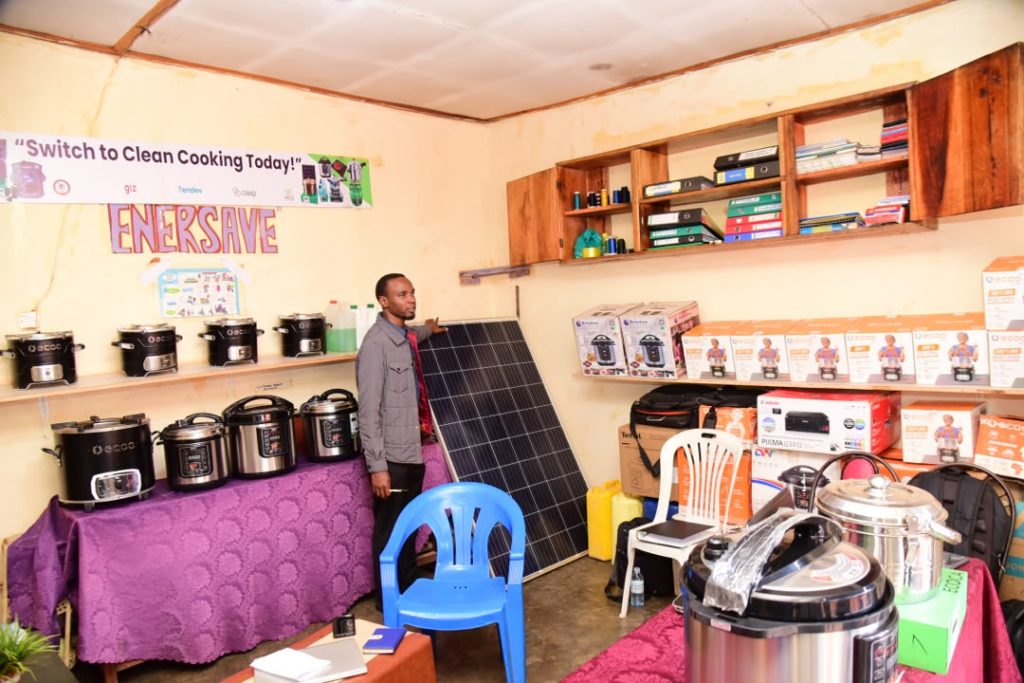Emmanuel Bassa, the director of Enersave Enterprises Limited showcasing some of the solar technologies offered by the company