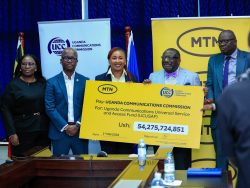 Part of MTN's leadership team poses for a photo with UCC's Leaders shortly after the cheque handover