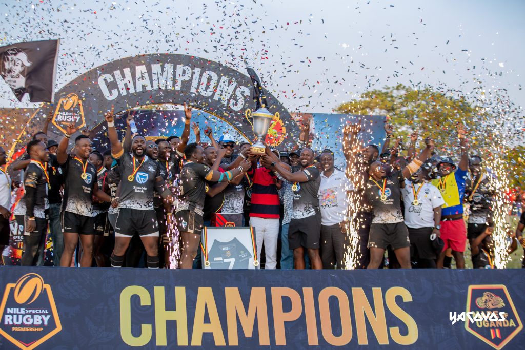 Stanbic Black Pirates players celebrate after lifting the 2026 National Rugby Premiership trophy following their dramatic 30–29 victory over Buffaloes RFC in the championship final