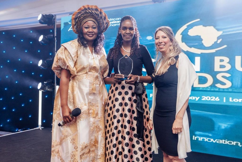 Winfred Warui, Senior Manager, International Banking and Cross-Border Payments at Equity Bank Uganda upon receiving the Corporate Business of the Year award on behailf of the bank (2)