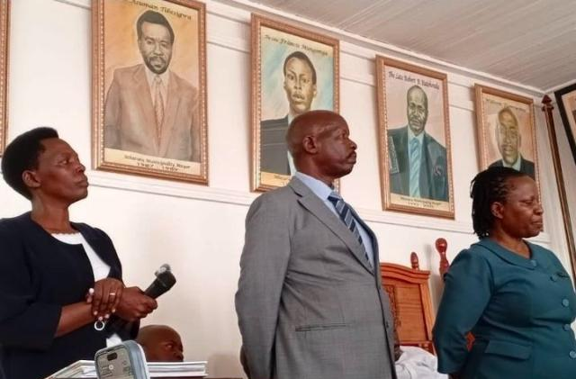 Dina Mwije the Procurement Officer (L) Simon Ejua Deputy Town Clerk, and Justin Barekye the Town Clerk