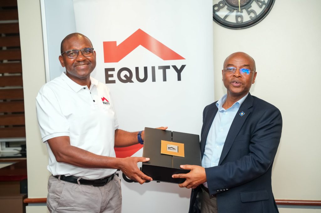 Gift Shoko, the Manging director of Equity Bank and Professor Augustus Nuwagaba, the deputy Govenor Bank of Uganda