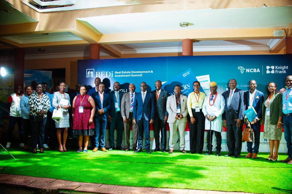 Partners pose for a group photo at a recent Real Estate and Infrastructure Conference