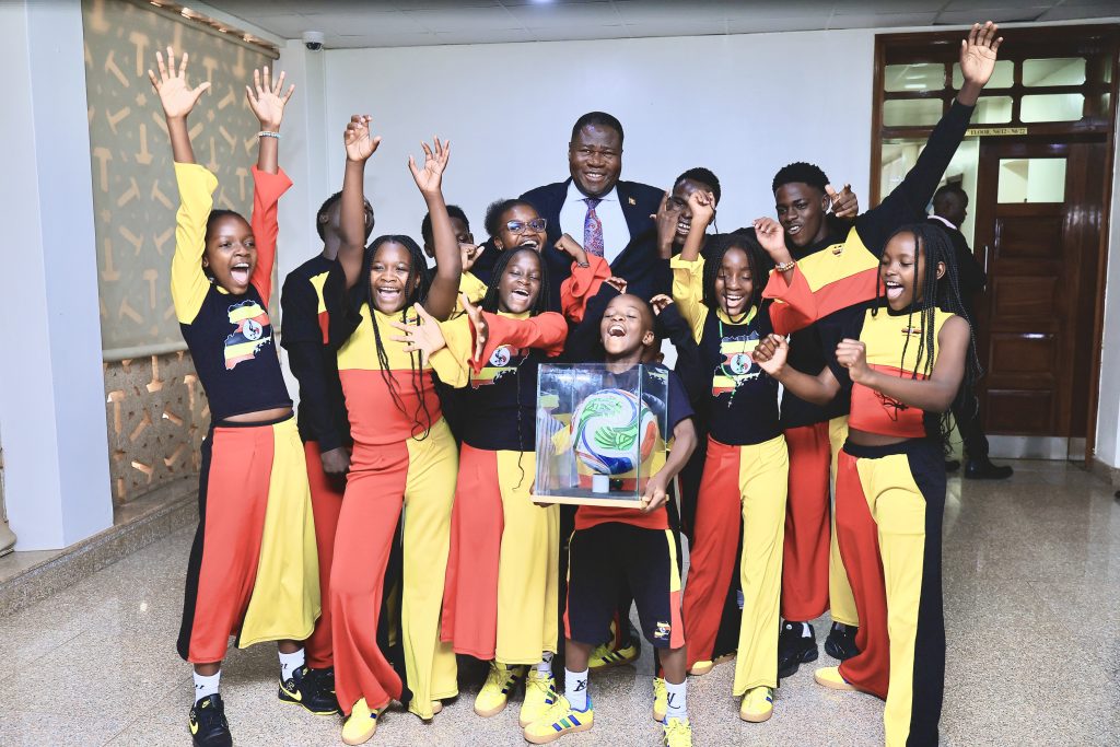 Speaker Oboth Oboth in a group photo with the Ghetto Kids
